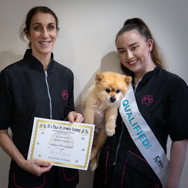 Christine Exley and student with diploma